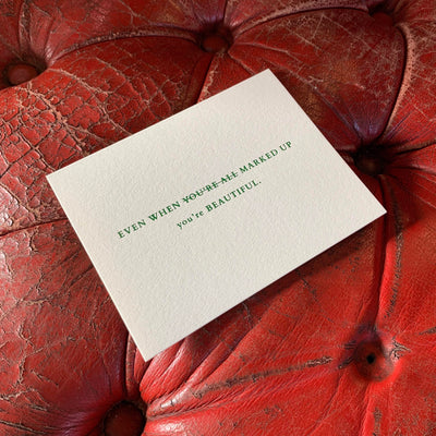 Greeting card on vintage, leather couch by beknown. Even when you're all marked up you're beautiful.