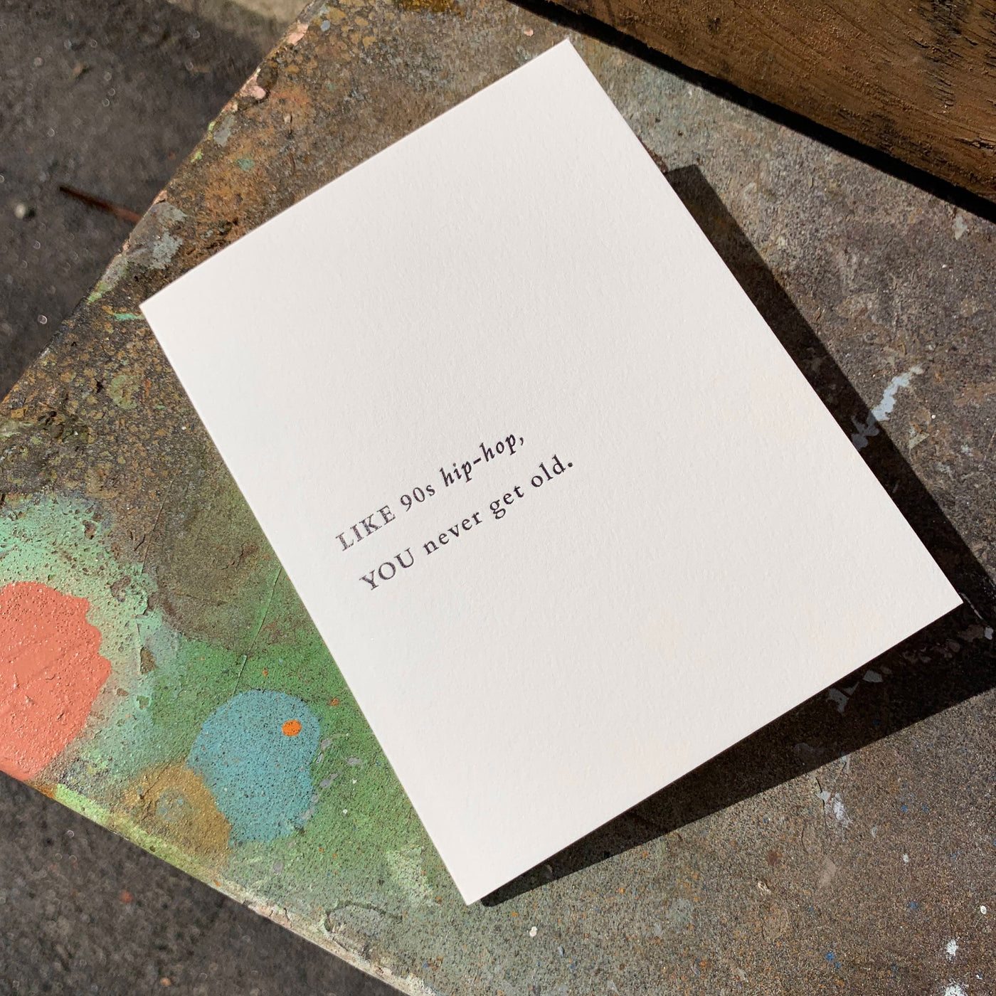 Greeting card on rusted table by beknown. Like 90s hip-hop, you never get old.