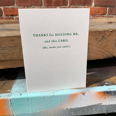 Greeting card on rusted table by beknown. Thanks for holding me, and this card. (Ha, made you smile.)