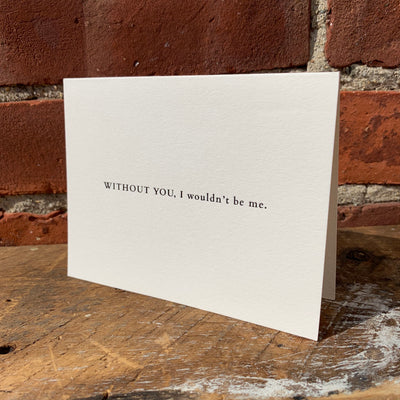 Greeting card on wood table by beknown. Without you, I wouldn't be me.