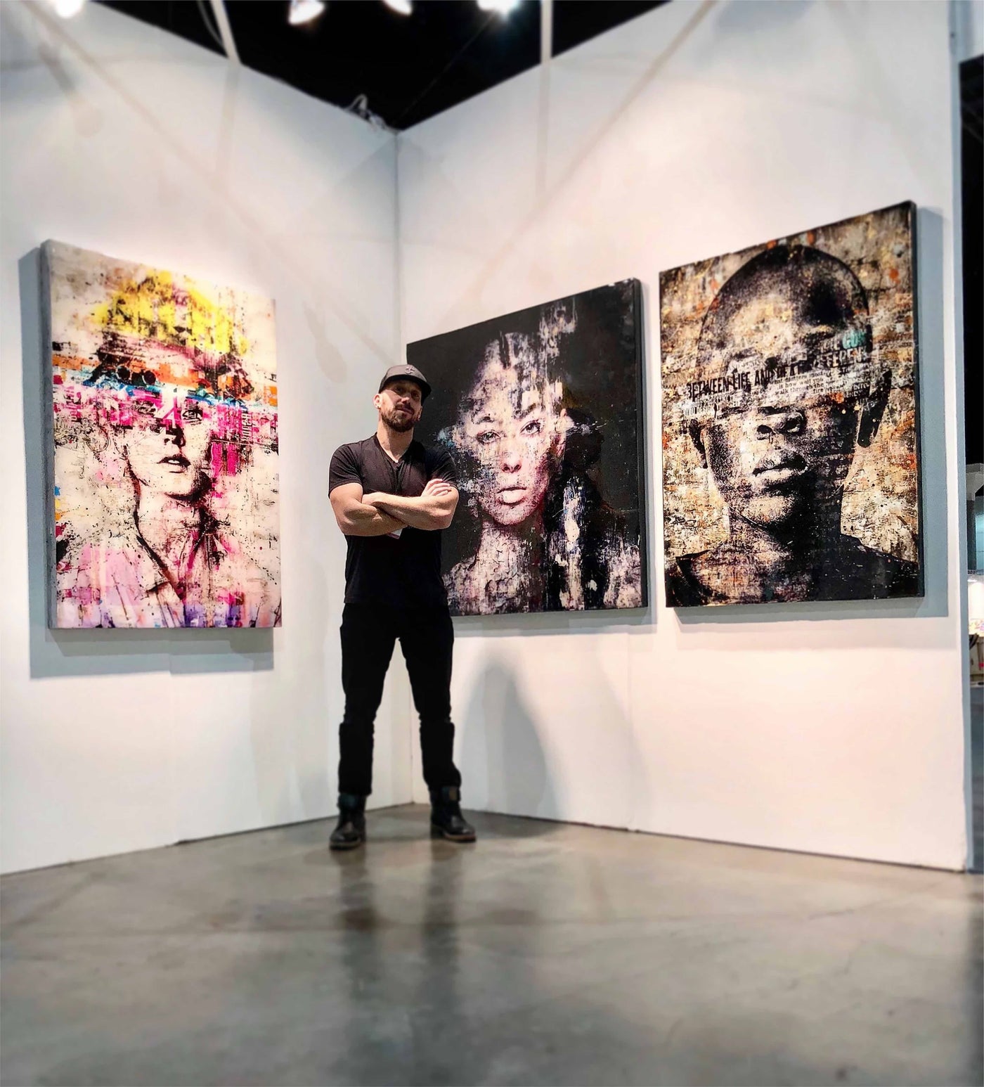Markus Sebastiano of the Blochaus Art Gallery, standing in front of his artwork. He is the inspiration for the card, This is a hug-hug, the real thing, like you, which is part of the be well collection by beknown.